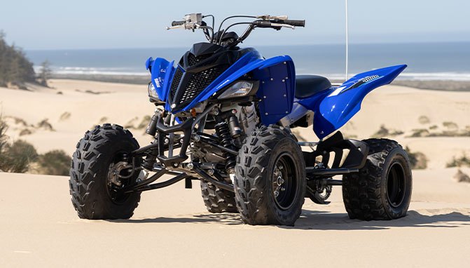 yamaha sport atv shootout yfz450r vs raptor 700r, yamaha sport atv raptor 700r stationary on dune