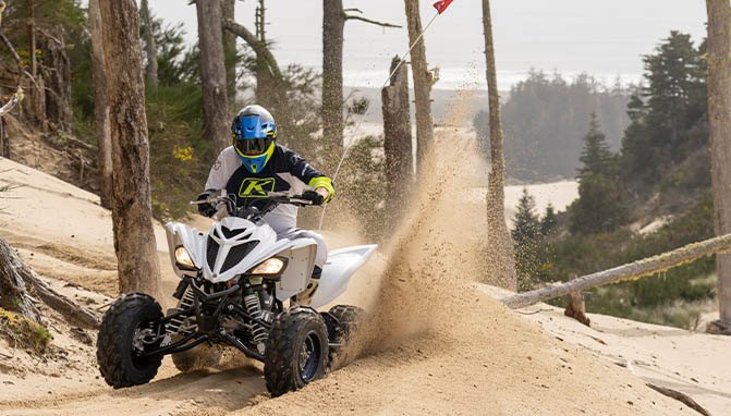 yamaha sport atv shootout yfz450r vs raptor 700r, yamaha sport atv raptor700r turn in trees