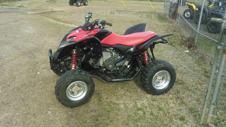 this 4 wheeler is in good shape and has these extras 2 rear wheel and paddle