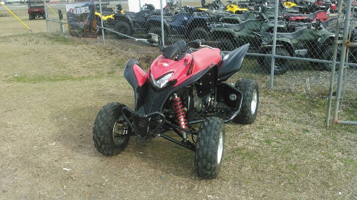this 4 wheeler is in good shape and has these extras 2 rear wheel and paddle