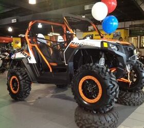 custom rzr 14 orange beadlocks with 28 tires winch kicker stereo with 4