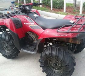 750cc v twin has aftermarket tires winch and brush