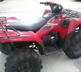 750cc v twin has aftermarket tires winch and brush