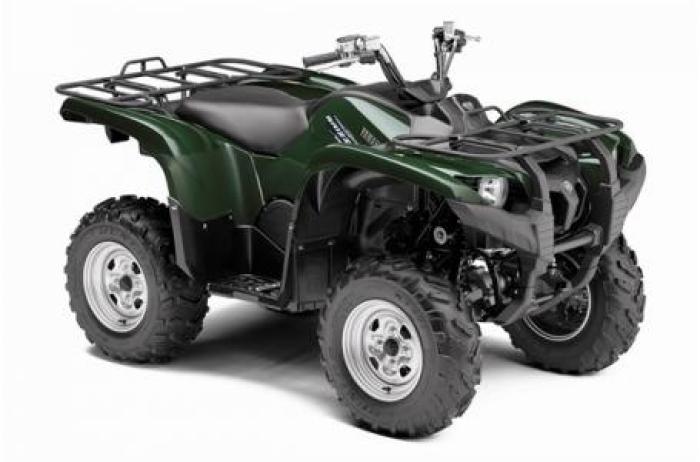 brand new green 2011 grizzly 550 4wd with factory warranty