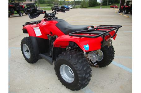 one lady owner babied this mid sized utility quad it would be a good choice for
