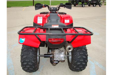 one lady owner babied this mid sized utility quad it would be a good choice for