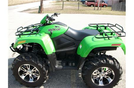 check out this arctic cat 700h1 comes with big rims and tires and has very low