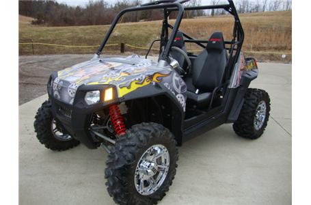the rzr s you see here has been modified with an awesome throaty sounding looney