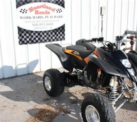 very clean kawasaki atv with reverse low hours and ready for the trails or the