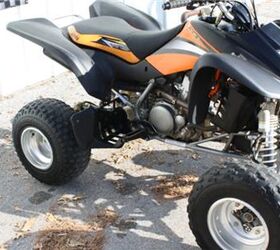 very clean kawasaki atv with reverse low hours and ready for the trails or the