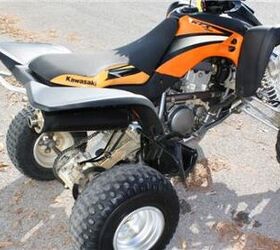 very clean kawasaki atv with reverse low hours and ready for the trails or the