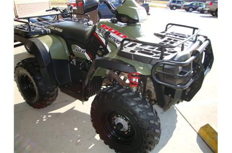 this sportsman 600 has heavy duty bumpers on both ends and rack extenders for
