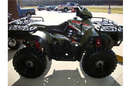 this sportsman 600 has heavy duty bumpers on both ends and rack extenders for