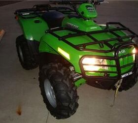 this arctic cat 400 is a hoss with a tall stance and long travel suspension it is