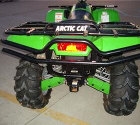 this arctic cat 400 is a hoss with a tall stance and long travel suspension it is