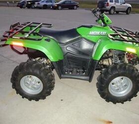 this arctic cat 400 is a hoss with a tall stance and long travel suspension it is