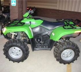 this arctic cat 400 is a hoss with a tall stance and long travel suspension it is