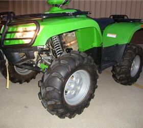 this arctic cat 400 is a hoss with a tall stance and long travel suspension it is