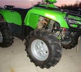 this arctic cat 400 is a hoss with a tall stance and long travel suspension it is