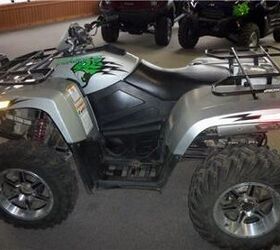 this atv is in fair shape it has fox piggy back shocks all around the atv it has