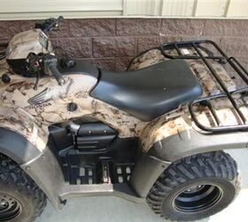 super popular atv with the factory camo body 1140 miles lookin good and ready to