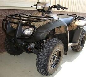 super popular atv with the factory camo body 1140 miles lookin good and ready to