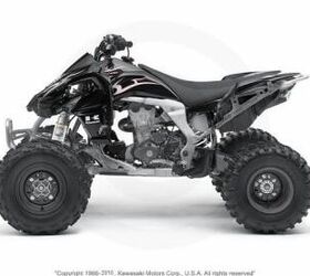 this quad is very clean and has a yoshimura exhaust and handguards call for more