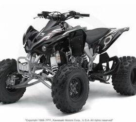 this quad is very clean and has a yoshimura exhaust and handguards call for more