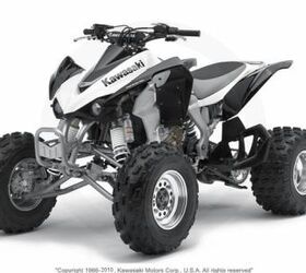 this quad is very clean and has a yoshimura exhaust and handguards call for more