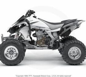 this quad is very clean and has a yoshimura exhaust and handguards call for more