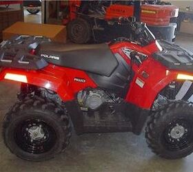 here is a deal this is a new sportsman 300 we have used it as a demo unit and