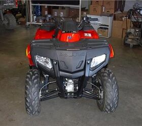 here is a deal this is a new sportsman 300 we have used it as a demo unit and