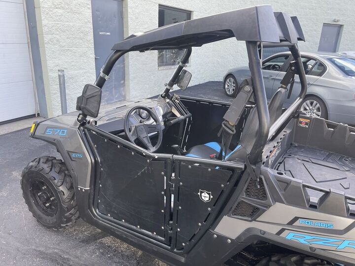 only 654 miles power steering 2500lb polaris winch roof windshield side view