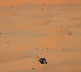 surprises and trophies at the dakar rally, That s a photo of Mitchell Guthrie surrounded by a lot of desert Photo Red Bull