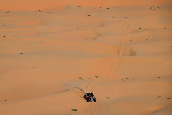 surprises and trophies at the dakar rally, That s a photo of Mitchell Guthrie surrounded by a lot of desert Photo Red Bull