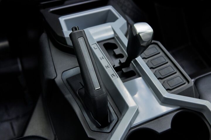 You won't find some center consoles and controls this nice in some high end cars. The new center console design features a new cell phone storage pocket at the front, as well as 4 accessory cutouts perfect for aftermarket rocker switches.