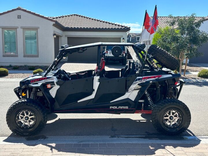 pristine 2014 rzr 1000xp4 extremely low mileage 15 000 in mods, Dual lighted gorilla whips and MTX speakers
