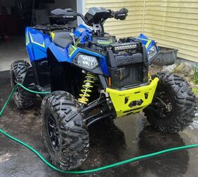 How should you wash your ATV after a ride?