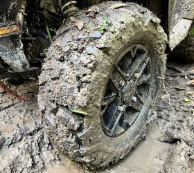 All-terrain tires work great in a wide array of circumstances. They tend to be lacking a bit in the mud traction department, with a tendency to "ball up" and subsequent difficulty "cleaning out."