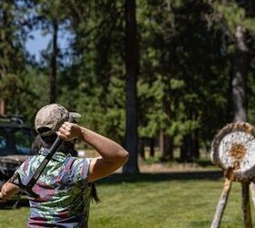 A variety of activities are available while you're camped out at Alpine Falls. Kyra took to the axe throwing like an old pro, and at one point was wielding two axes! Photo Credit: WESTx1000