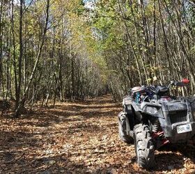 Thankfully this photo was taken during a brief stop to change a flat tire, but regardless of the circumstance you should be ready to deal with any kind of emergency situation when ATV-ing in the fall. Photo Credit: Ross Ballot