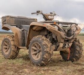  In its XT-R trim, the Grizzly gets upgraded wheels and tires, a Warn winch, and there’s even a nice two-tone factory paintjob under all that mud. Credit: Kurt Spurlock